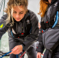 Preview: Crewsaver - CrewFit 180N Pro Automatic & Harness Black-Red Action